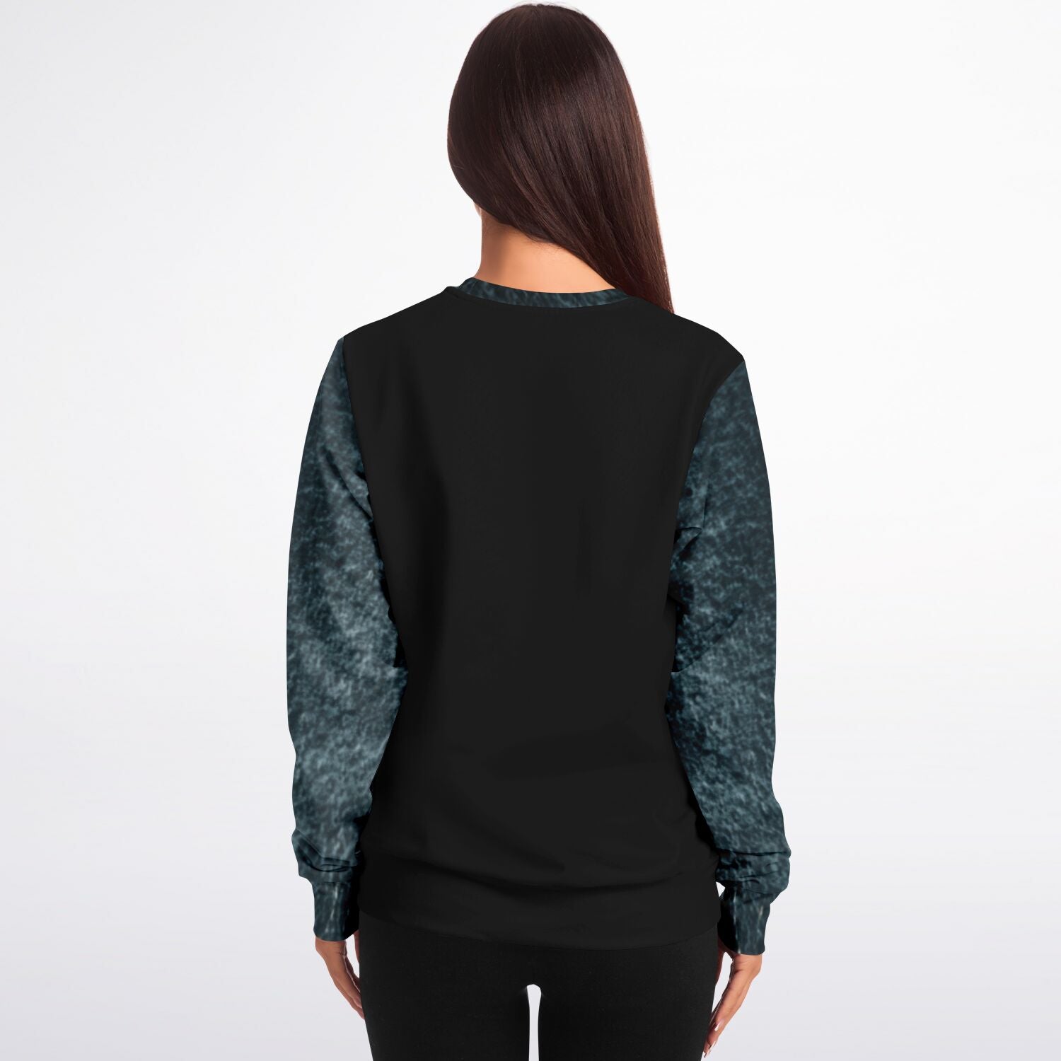 Person wearing a black outfit with blue sleeves on a white background