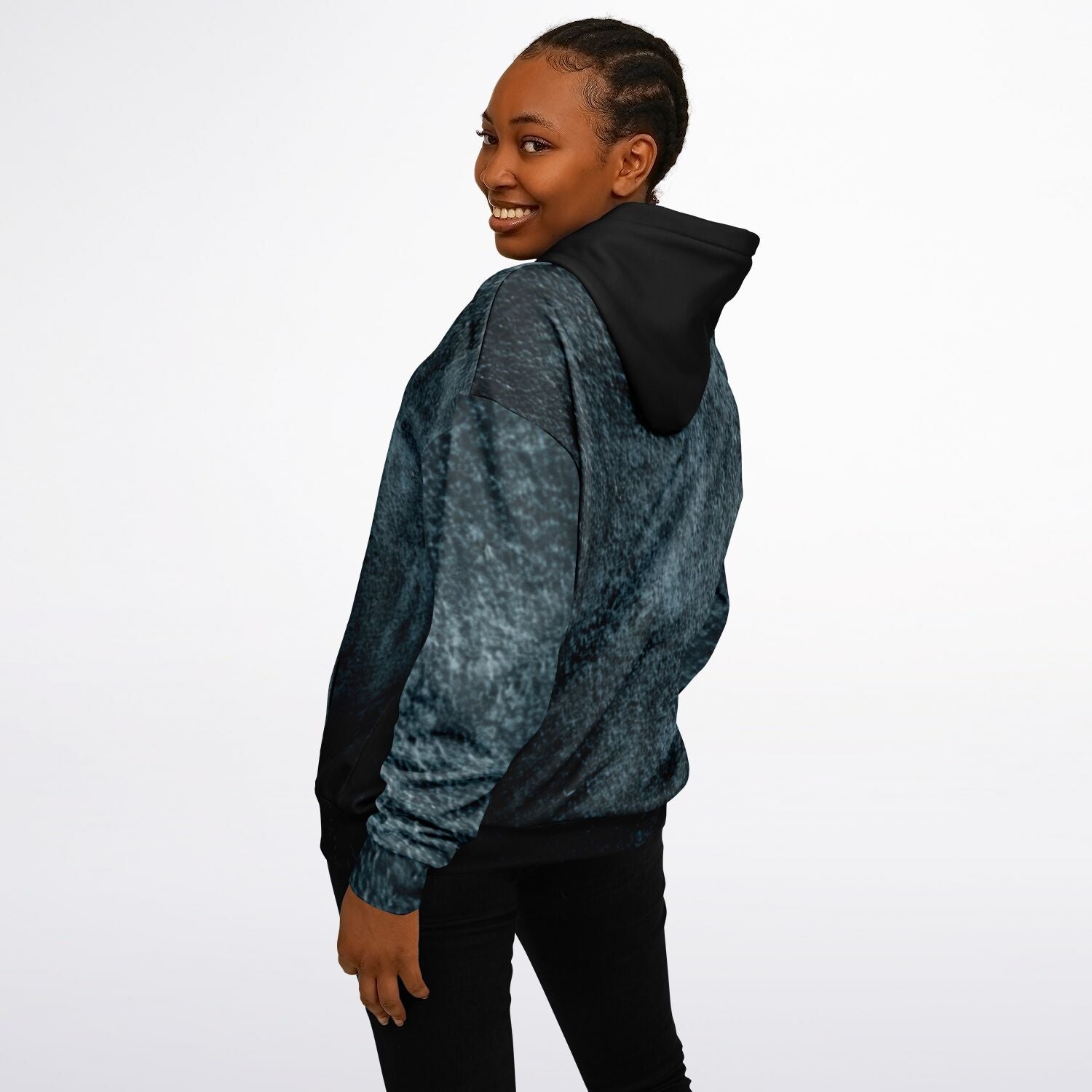 Person wearing a blue and black patterned hoodie on a white background